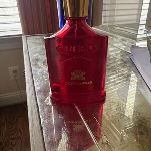 Creed Red Perfume Bottle with Gold Detail